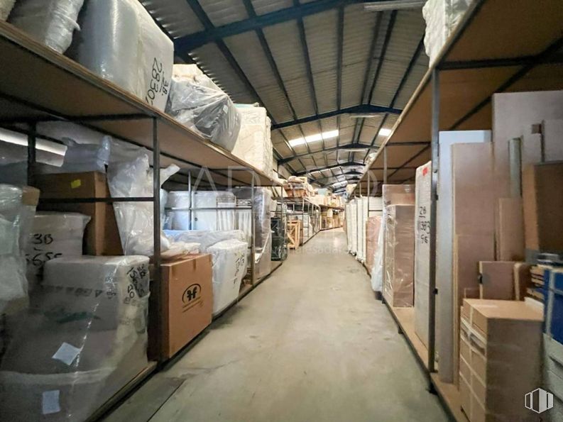 Industrial for sale at Zona industrial, Torrejón de Ardoz, Madrid, 28850 with shelving, inventory, shelf, warehouse, ceiling, shipping box, cardboard packaging, design, packaging and labeling and collection around