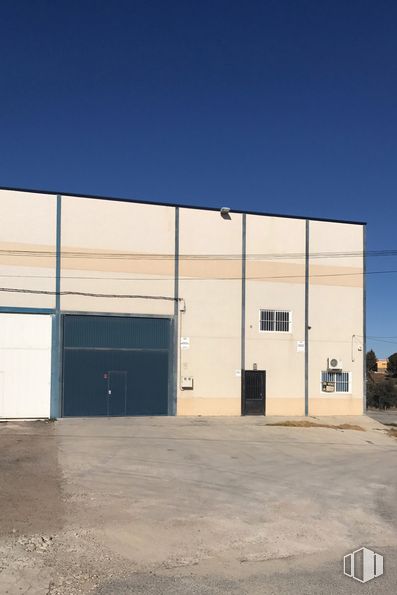 Industrial for sale at Carretera Navalpino, 9, Guadamur, Toledo, 45160 with building, sky, asphalt, wood, house, shade, fixture, road surface, rectangle and composite material around