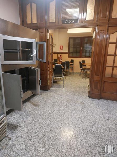 Retail for sale at Calle Doctor Santero, Tetuán, Madrid, 28039 with chair, furniture, wood, interior design, cabinetry, shelf, flooring, floor, shelving and hardwood around