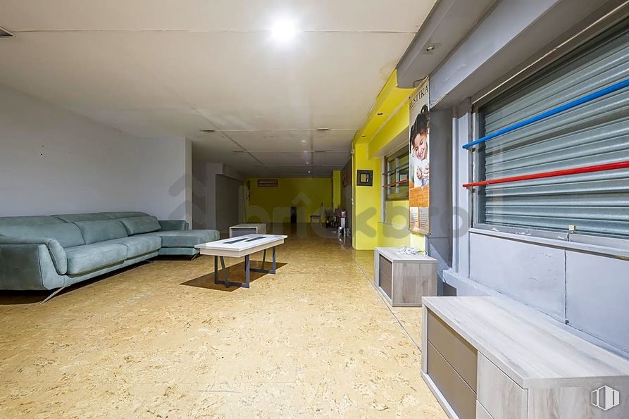 Retail for sale at Calle Gerardo de Diego, 1, Puente de Vallecas, Madrid, 28038 with couch, cabinetry, interior design, floor, flooring, building, comfort, fixture, television and ceiling around