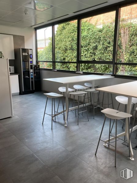 Office for sale at Avenida Institución Libre de Enseñanza, 37 C, San Blas - Canillejas, Madrid, 28037 with stool, window, table, refrigerator, flooring, interior design, furniture, floor, glass and grey around