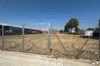 Land for sale & for rent at Polígono industrial P29, Collado Villalba, Madrid, 28400 with sky, tree, mesh, fence, wire fencing, land lot, road surface, plant, building and home fencing around