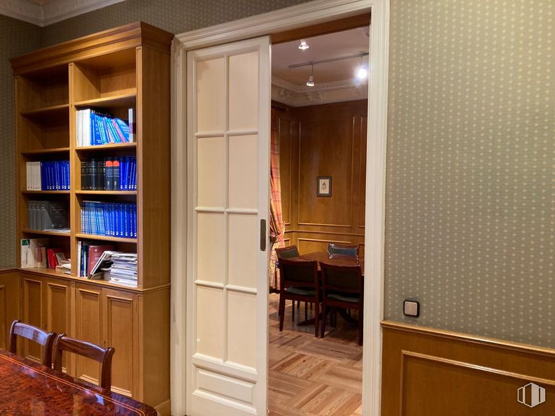 Office for rent at Calle Velázquez, 114, Salamanca, Madrid, 28006 with chair, bookcase, door, table top, furniture, wall, flooring, interior design, wood and floor around