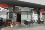 Retail for sale at Avenida Industria, Tres Cantos, Madrid, 28760 with stool, chair, person, table, furniture, public space, shade, real estate, door and building around