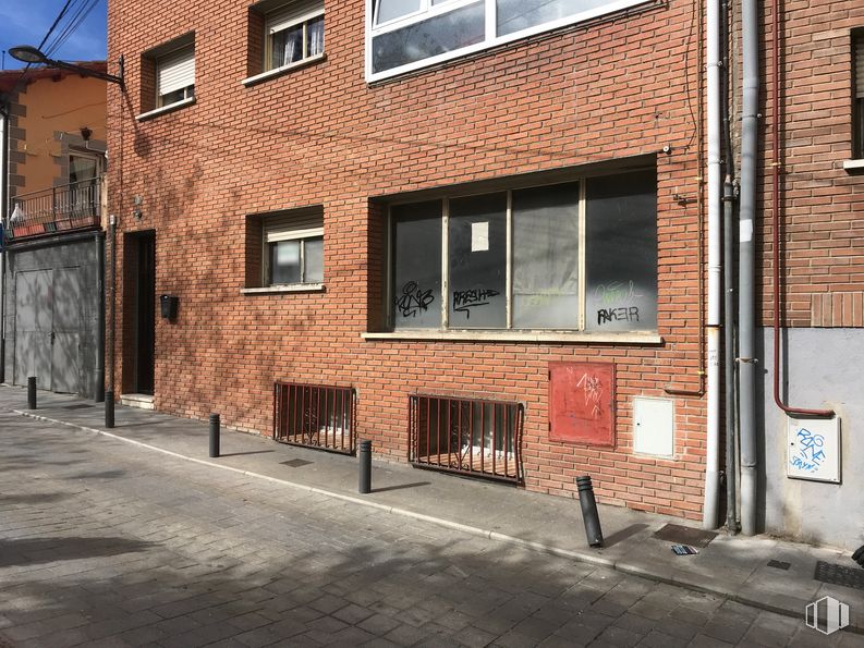 Retail for rent at Calle San Francisco de Asís, 15, Guadarrama, Madrid, 28440 with window, building, fireplace, property, road surface, brickwork, brick, fixture, wood and neighbourhood around