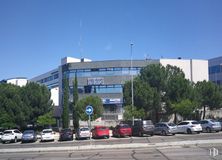 Office for rent at Avenida Severo Ochoa, 36, Alcobendas, Madrid, 28100 with car, stadium, land vehicle, wheel, sky, vehicle, tire, street light, infrastructure, tree and building around