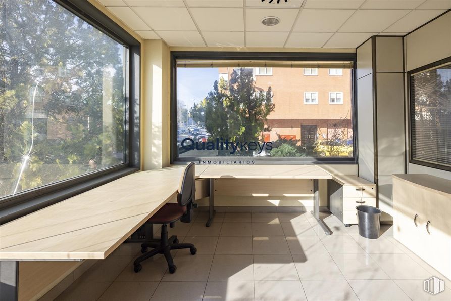 Retail for sale at Calle Rocinante, Fuencarral - El Pardo, Madrid, 28034 with chair, window, building, table, interior design, wood, furniture, flooring, floor and glass around