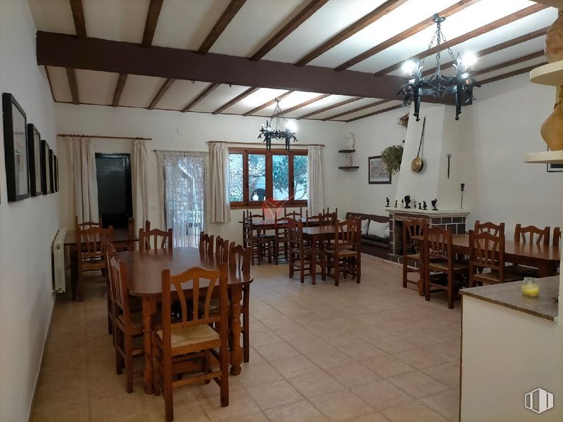 Retail for sale at Centro, Huete, Cuenca, 16540 with kitchen & dining room table, lighting, chair, light fixture, window, chandelier, furniture, wood, interior design and flooring around