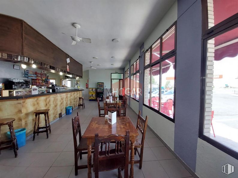 Retail for sale at Autovía A-6, Adanero, Ávila, 05296 with kitchen & dining room table, ceiling fan, chair, table, stool, table top, window, furniture, property and interior design around