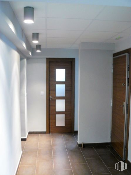 Office for rent at El Viso, Chamartín, Madrid, 28002 with door, light fixture, lighting, flooring, wall, floor, wood, interior design, home door and wood flooring around