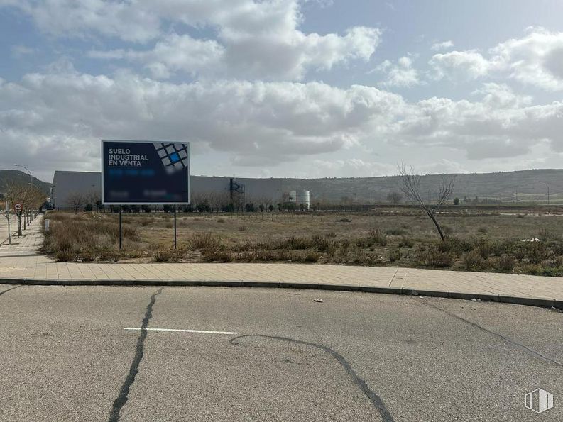 Land for sale at Polígono Albolleque, Chiloeches, Guadalajara, 19160 with traffic sign, cloud, sky, road surface, plant, asphalt, land lot, plain, thoroughfare and rural area around