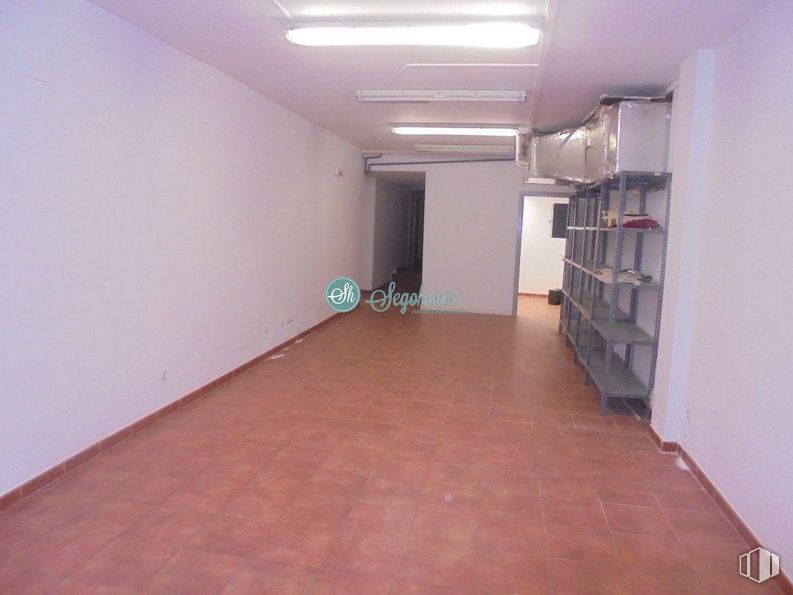 Office for rent at Calle San Frutos, Segovia, 40001 with furniture, fixture, bookcase, hall, interior design, building, floor, wood, flooring and shelf around