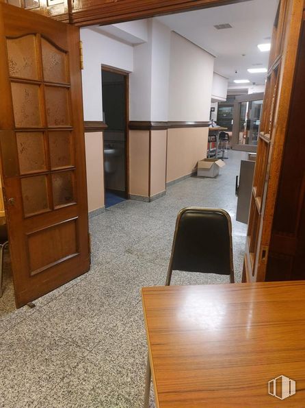 Retail for sale at Calle Doctor Santero, Tetuán, Madrid, 28039 with cabinetry, table, furniture, wood, fixture, interior design, flooring, door, floor and wood stain around