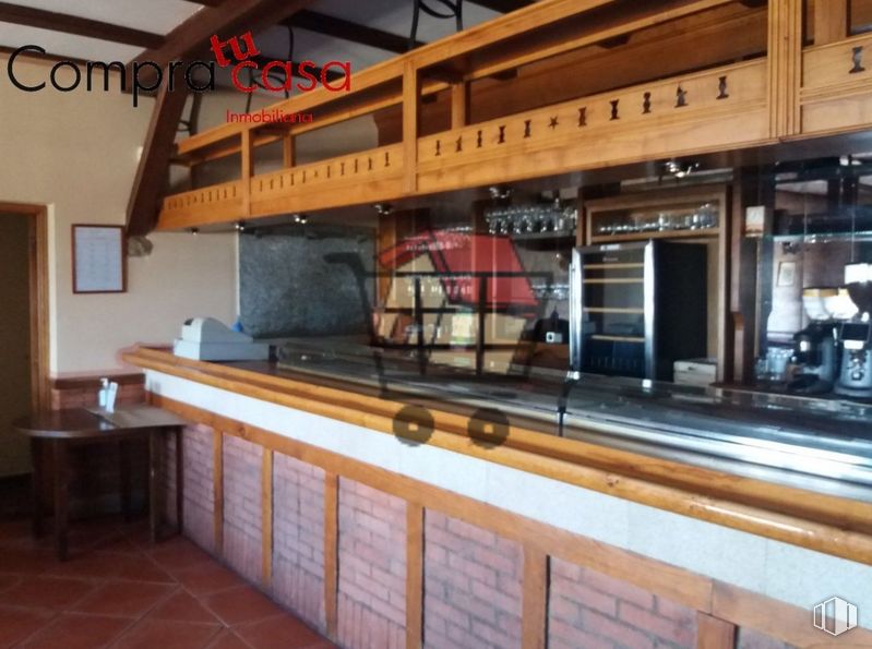 Retail for sale at Calle Castejón, Otero de Herreros, Segovia, 40422 with table, furniture, wood, building, interior design, floor, flooring, countertop, hardwood and wood stain around