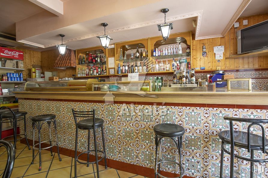 Retail for sale at Zona del Val, Alcalá de Henares, Madrid, 28804 with stool, television, light fixture, lighting, property, furniture, countertop, interior design, barware and bar stool around