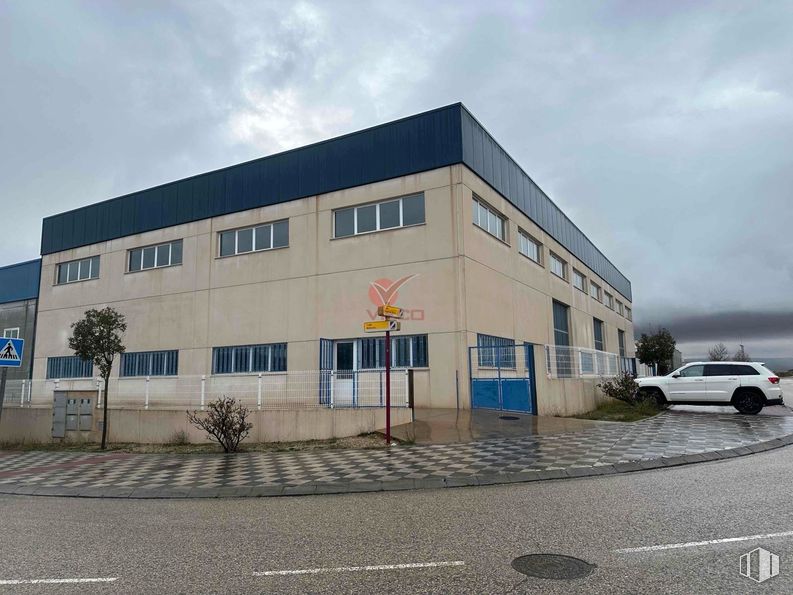 Industrial for sale at P.I. Ctra. Motilla, Cuenca, 16004 with car, sky, automotive parking light, cloud, window, wheel, vehicle, building, tire and street light around