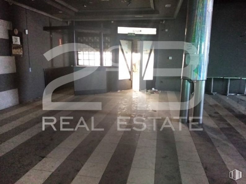 Retail for sale at Zona Eurovillas, Nuevo Baztán, Madrid, 28514 with fixture, floor, flooring, parking, ceiling, city, concrete, symmetry, composite material and wood around