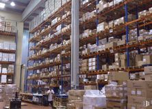 Industrial for rent at Polígono Industrial Sur, San Agustín del Guadalix, Madrid, 28750 with packaged goods, shelf, building, shelving, wood, retail, warehouse, shipping box, mass production and publication around