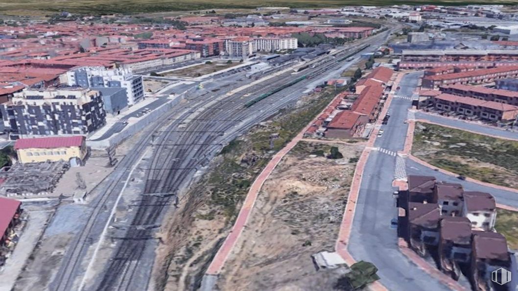 Land for sale at Calle Irlanda, s/n, Ávila, 05004 with building, train, transport hub, infrastructure, thoroughfare, urban design, track, residential area, landscape and road around