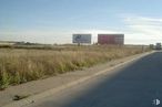 Land for sale at Avenida Industria, Yunquera de Henares, Guadalajara, 19210 with building, cloud, sky, plant, ecoregion, road surface, asphalt, land lot, natural landscape and tar around