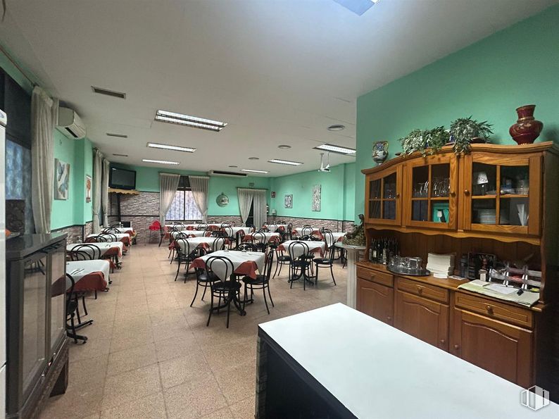 Retail for sale at Zona Fuenlabrada, Fuenlabrada, Madrid, 28944 with chair, light fixture, cabinetry, kitchen & dining room table, lighting, furniture, flooring, table, restaurant and floor around