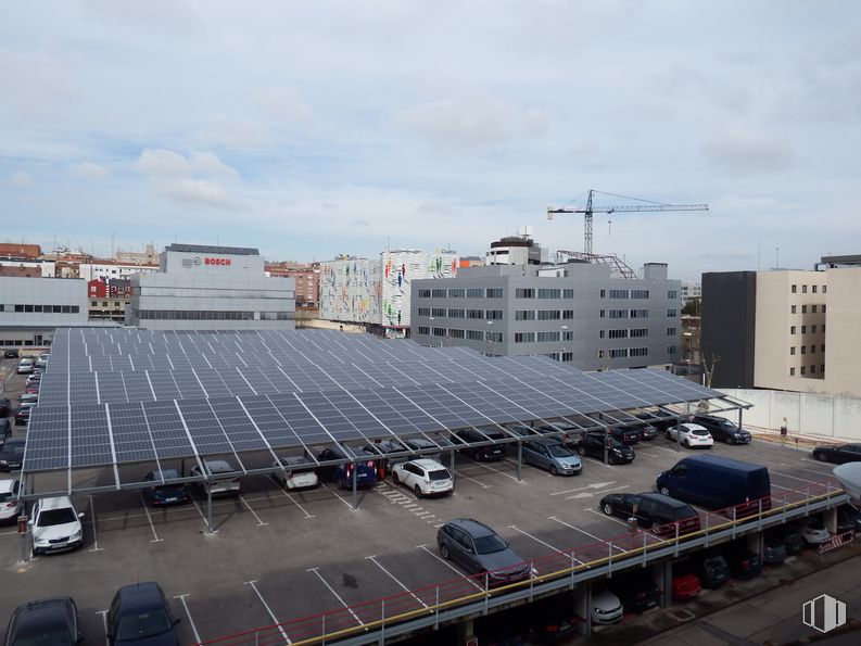 Industrial for sale at Calle Albasanz, 14 B, San Blas - Canillejas, Madrid, 28037 with building, cloud, sky, wheel, car, vehicle, infrastructure, window, architecture and motor vehicle around