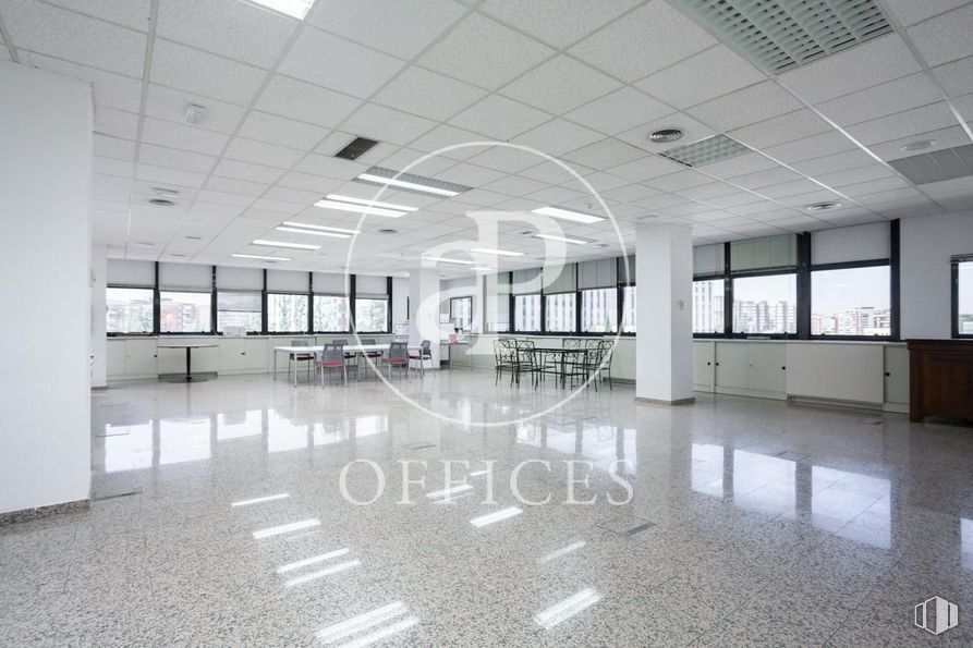 Office for rent at Zona nudo Norte Madrid, Fuencarral - El Pardo, Madrid, 28034 with cabinetry, lighting, fixture, building, hall, flooring, floor, window, line and ceiling around