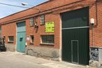 Industrial for sale at Calle Haya, 3, Arganda del Rey, Madrid, 28500 with door, window, property, sky, fixture, infrastructure, brickwork, wood, road surface and brick around