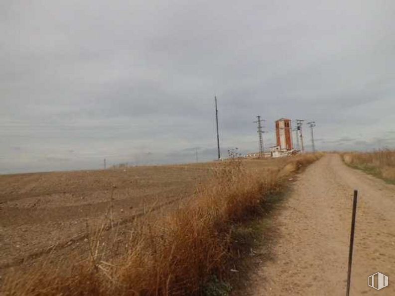 Land for sale at Sector S-8 5003, Cabañas de la Sagra, Toledo, 45592 with sky, cloud, plant, natural environment, natural landscape, overhead power line, land lot, road surface, asphalt and grass around