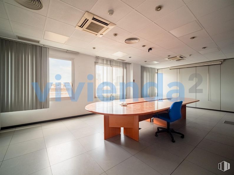 Retail for sale at Calle San Romualdo, San Blas - Canillejas, Madrid, 28037 with chair, desk, table, furniture, building, conference room table, interior design, hall, office chair and architecture around