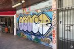 Retail for sale at Calle de Telémaco, 8, San Blas - Canillejas, Madrid, 28027 with door, art, graffiti, paint, font, facade, tints and shades, tree, building and road around