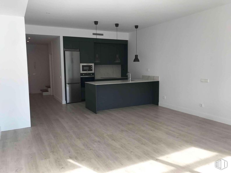 Office for rent at Zona Alcobendas, Alcobendas, Madrid, 28018 with refrigerator, light fixture, lighting, kitchen appliance, home appliance, flooring, floor, interior design, apartment and wood flooring around