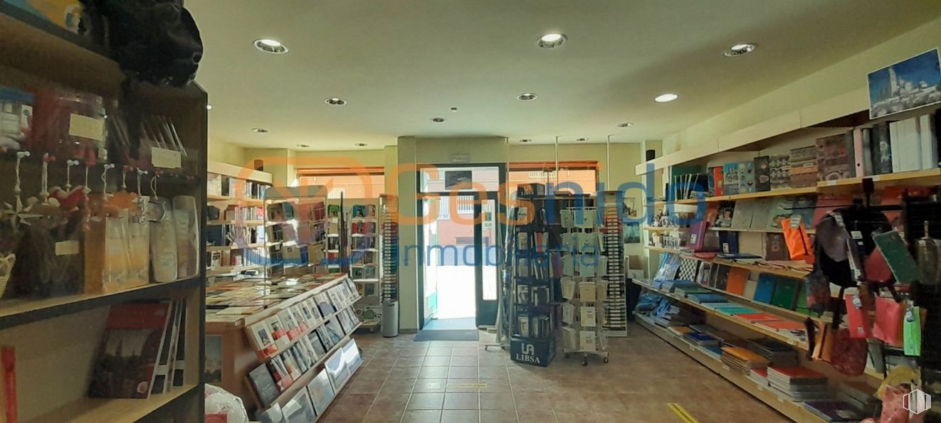 Retail for sale at Nueva Segovia, Segovia, 40006 with bookcase, shelf, furniture, product, shelving, publication, book, building, retail and floor around