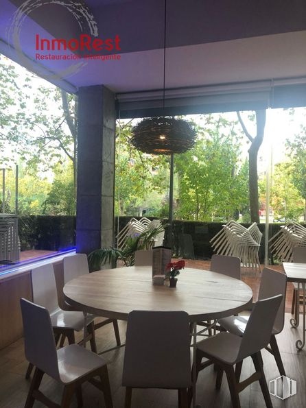 Retail for rent at Zona Tres Cantos, Tres Cantos, Madrid, 28760 with chair, lighting, table, furniture, property, tree, interior design, shade, architecture and plant around