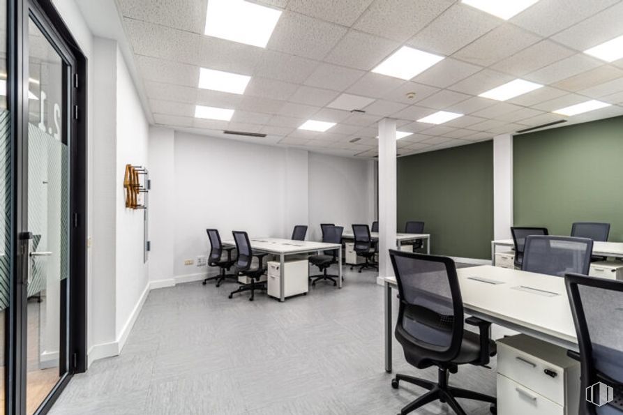 Office for rent at LOOM, Calle Huertas, 11, Centro, Madrid, 28012 with chair, desk, filing cabinet, door, furniture, interior design, flooring, office chair, ceiling and floor around