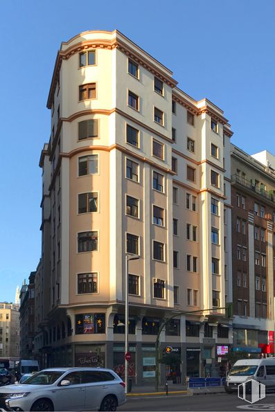 Oficina en alquiler en Calle Gran Vía, 45, Centro, Madrid, 28013 con edificio, ventana, tiempo de día, propiedad, cielo, rascacielos, bloque de pisos, diseño urbano, condominio y casa alrededor