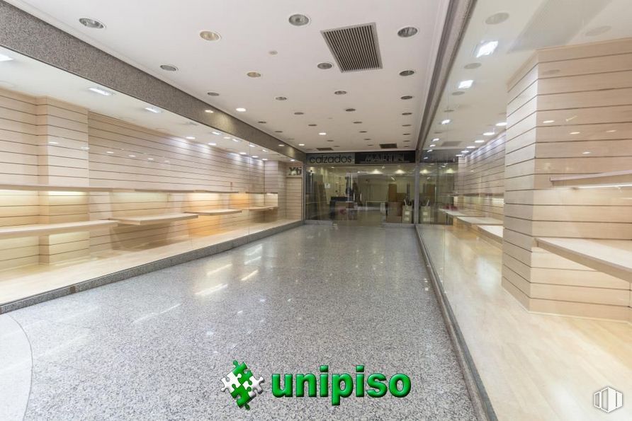 Retail for sale at Zona Salvador, Leganés, Madrid, 28911 with building, interior design, flooring, floor, fixture, glass, wood, ceiling, tile flooring and commercial building around