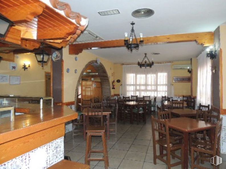 Retail for sale at Calle Felipe Solano Antelo, 16, Guadalajara, 19002 with kitchen & dining room table, countertop, lighting, chair, stool, table, furniture, property, wood and architecture around