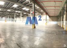 Industrial for rent at Prologis Park, Zona La Garena, Alcalá de Henares, Madrid, 28808 with fixture, building, flooring, parking, city, symmetry, ceiling, composite material, concrete and poster around