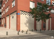 Retail for rent at Calle Anita Martínez, Leganés, Madrid, 28918 with building, window, road surface, brick, urban design, wood, brickwork, wall, neighbourhood and residential area around