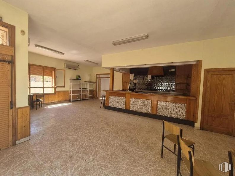 Retail for sale & for rent at Calle Paraiso, Torre del Burgo, Guadalajara, 19197 with door, window, chair, light fixture, wood, flooring, building, hardwood, wood stain and ceiling around