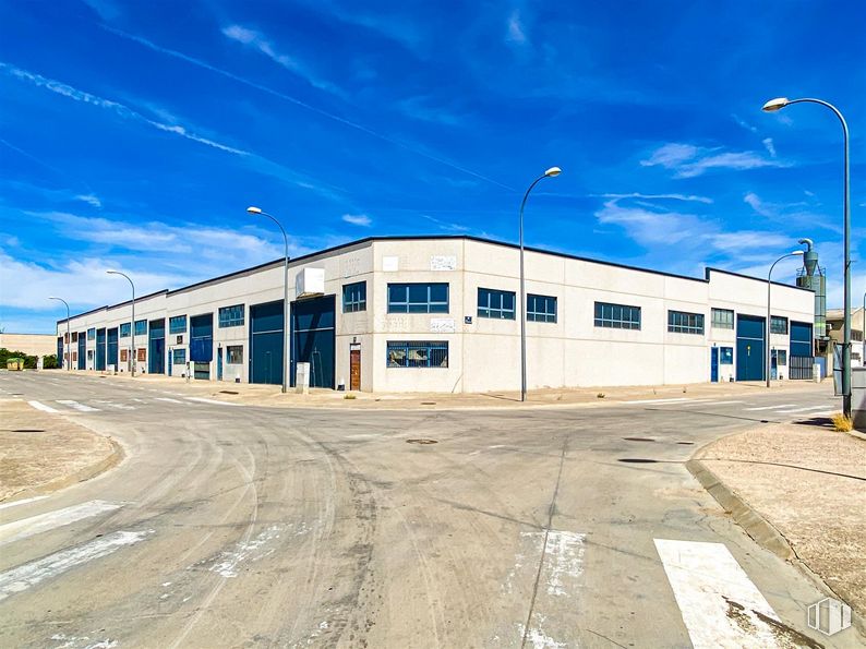 Industrial for sale at Avenida Industria, El Viso de San Juan, Toledo, 45215 with building, street light, cloud, sky, asphalt, road surface, residential area, landscape, rural area and facade around