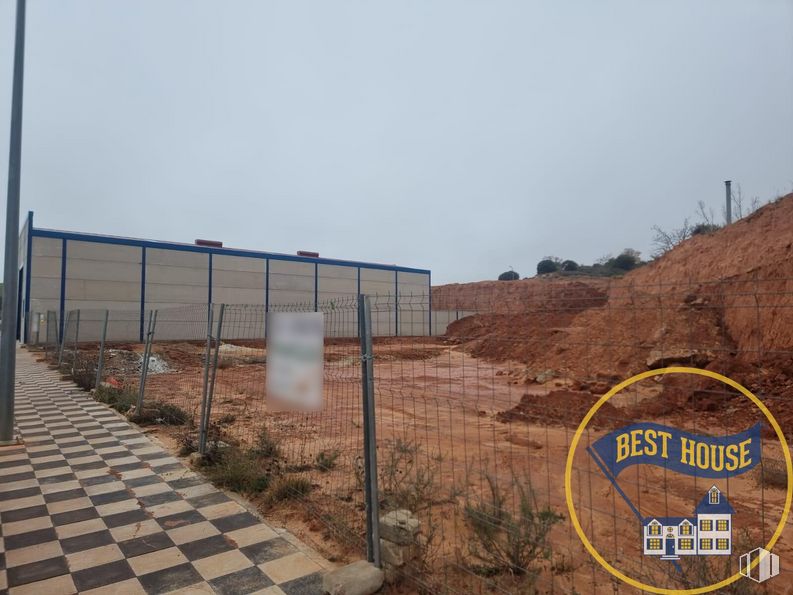 Land for sale at Zona Cruz Roja, Cuenca, 16002 with sky, plant, land lot, asphalt, grass, road surface, landscape, tree, road and urban design around