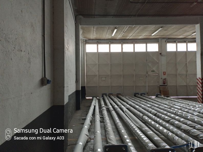 Industrial for rent at Calle Torre de Don Miguel, Villa de Vallecas, Madrid, 28031 with fixture, wood, flooring, composite material, gas, building, engineering, symmetry, hall and parallel around