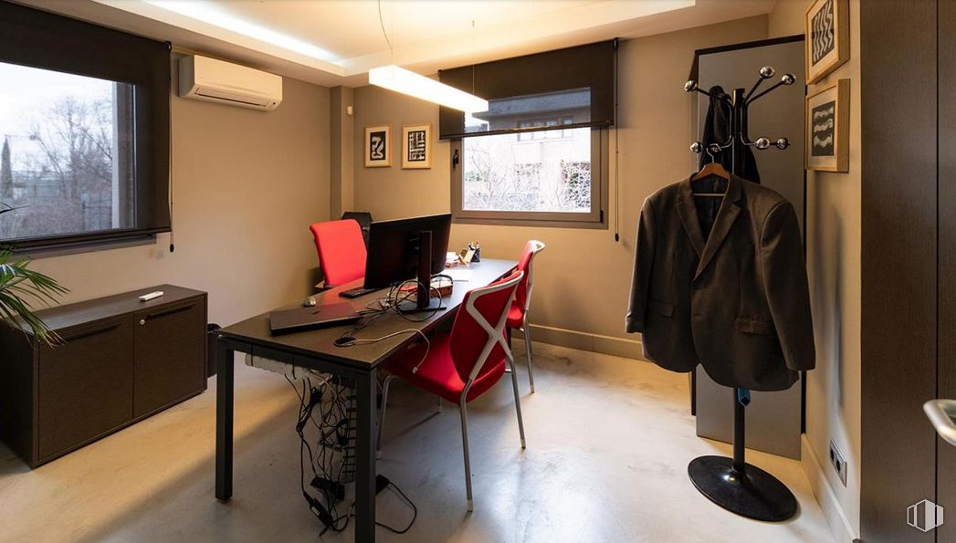 Office for sale at Zona El Plantío, Moncloa - Aravaca, Madrid, 28023 with chair, desk, coat, outerwear, light fixture, lighting, window, clothing, cabinetry and furniture around