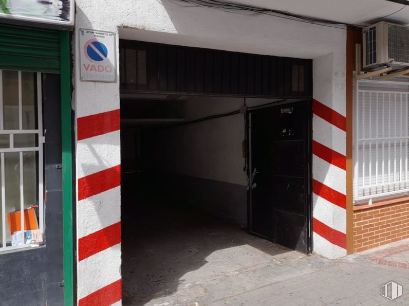 Industrial for sale at Calle Potasa, Villaverde, Madrid, 28021 with door, fixture, asphalt, composite material, gas, concrete, facade, building material, road surface and service around