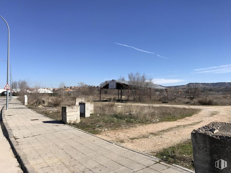 Land for sale at Calle Aceña, Guadalajara, 19004 with sky, plant, street light, cloud, road surface, land lot, sunlight, tree, horizon and asphalt around