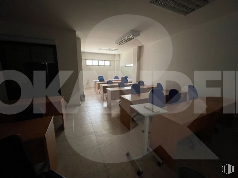 Office for rent at Avenida Irlanda, Toledo, 45005 with table, chair, building, interior design, fixture, automotive design, flooring, font, space and ceiling around