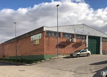 Industrial for sale at Calle Río Guadalquivir, 1, Algete, Madrid, 28110 with car, building, cloud, automotive parking light, sky, tire, wheel, street light, vehicle and asphalt around