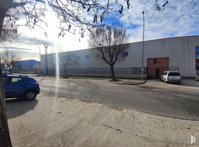 Industrial for sale at Polígono industrial Villacañas, Villacañas, Toledo, 45860 with car, automotive parking light, cloud, sky, land vehicle, daytime, tire, wheel, automotive lighting and vehicle around